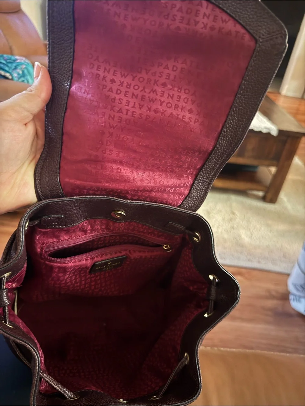 kate spade dark brown pebbled leather backpack with gold hardware